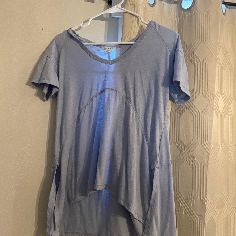 Francescas blue shirt